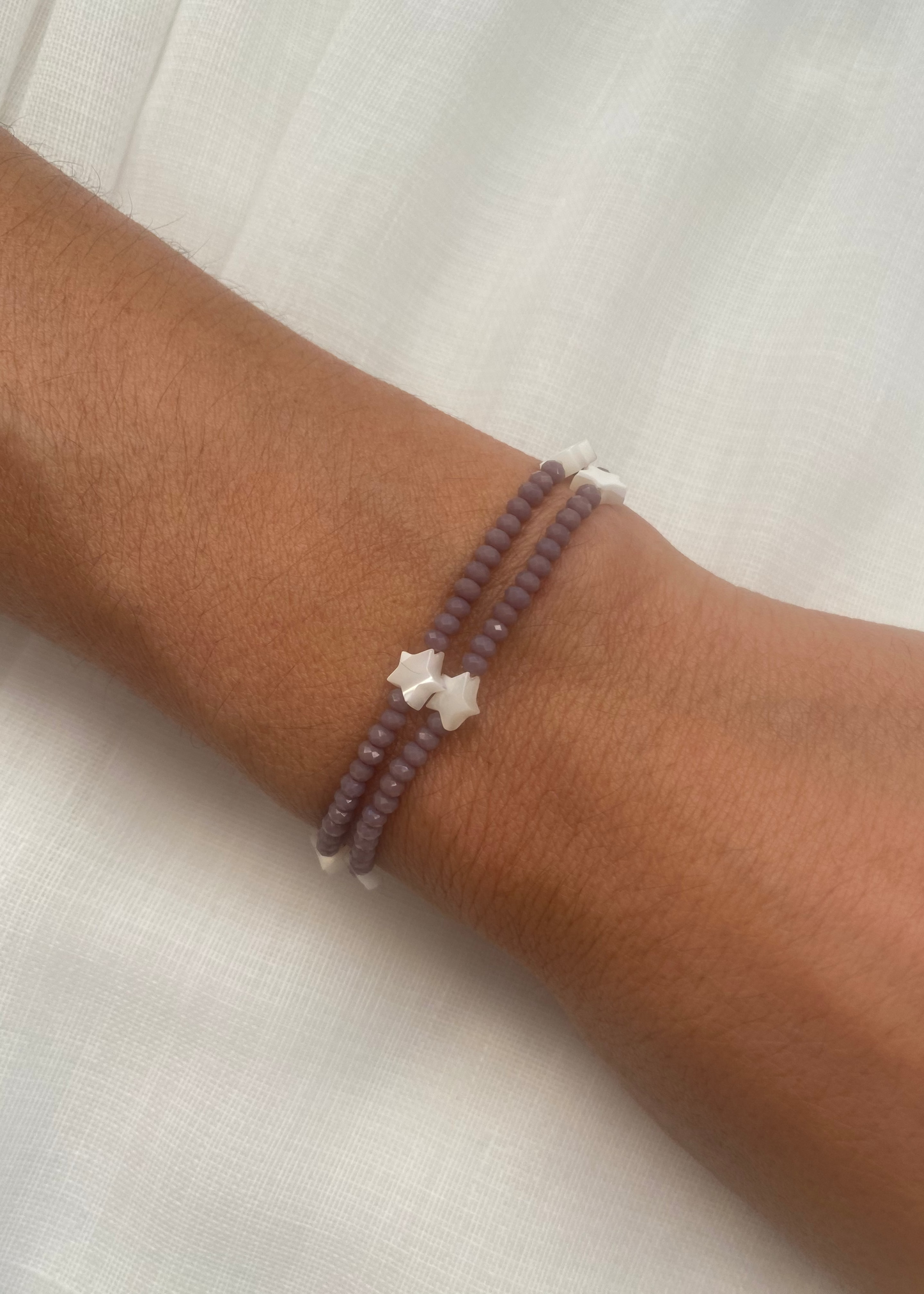 Pulsera doble estrellas nácar