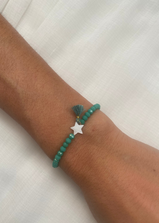 Pulsera estrella pompón