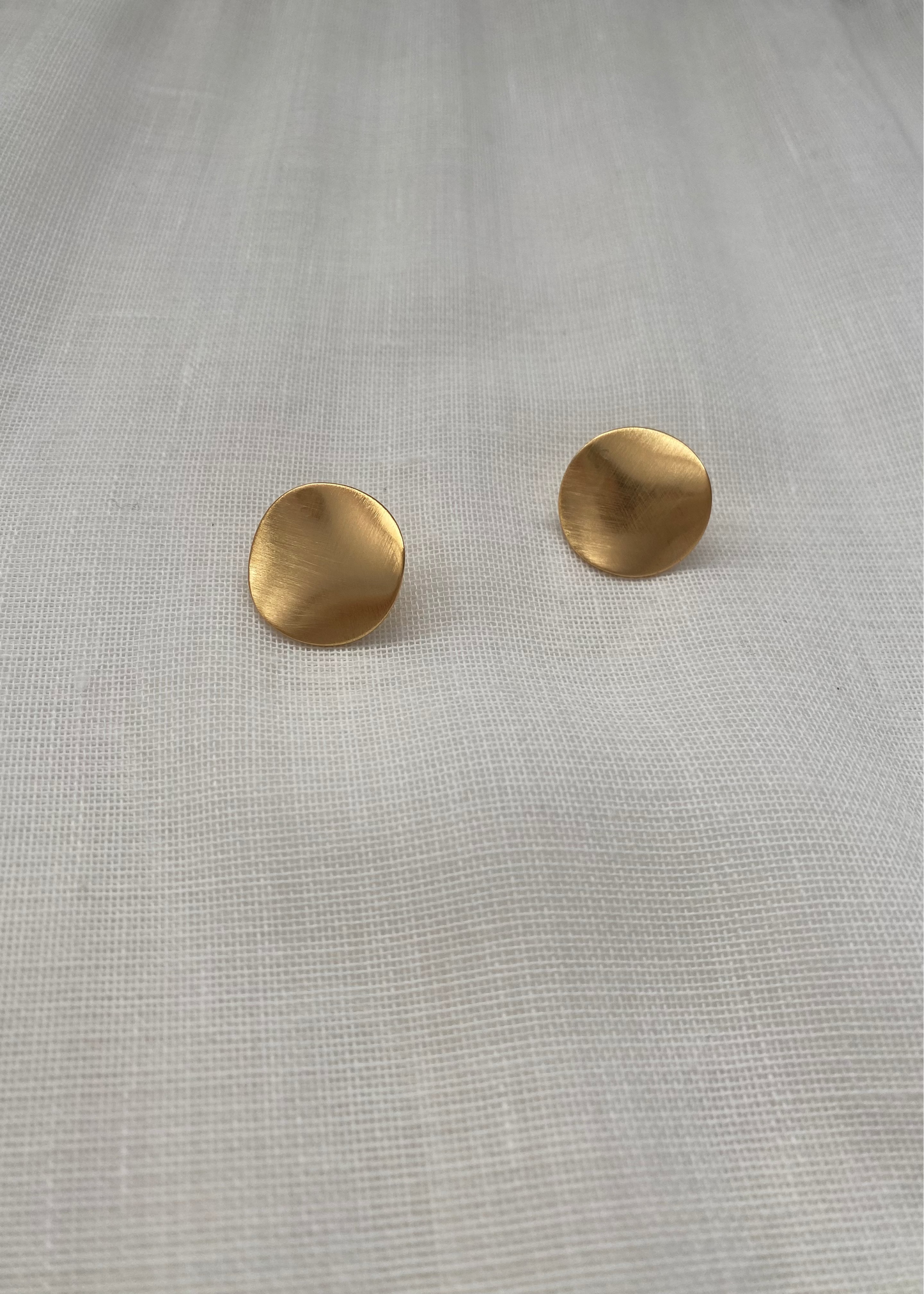 Pendientes achatados